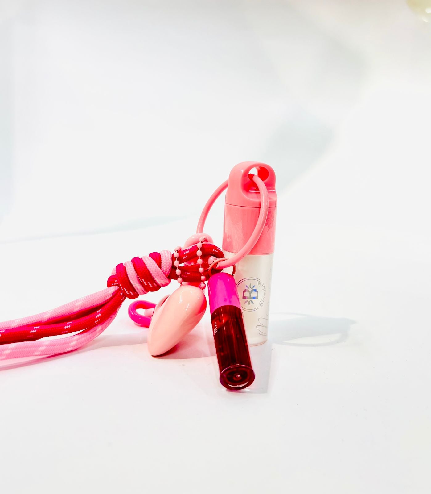 Llavero Duo Lip Gloss + Mini Tinta Bloomshell